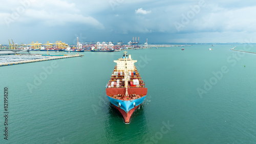 container ship sailing in sea, shipping business and industry service of cargo logistic import and export international freight transportation by container ship in open sea, aerial view