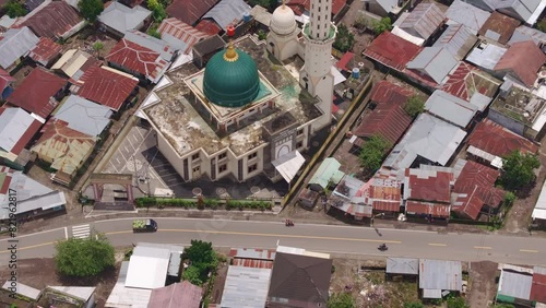 Wallpaper Mural Aerial view of village with mosque, homes, and rooftops surrounded by fields and Rinjani mountain, Sembalun, Lombok, Indonesia. Torontodigital.ca