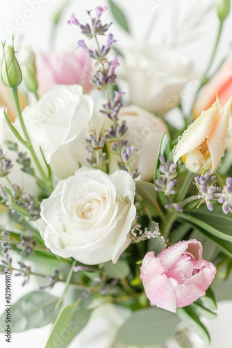 Small bouquet with dew-kissed flowers on white background