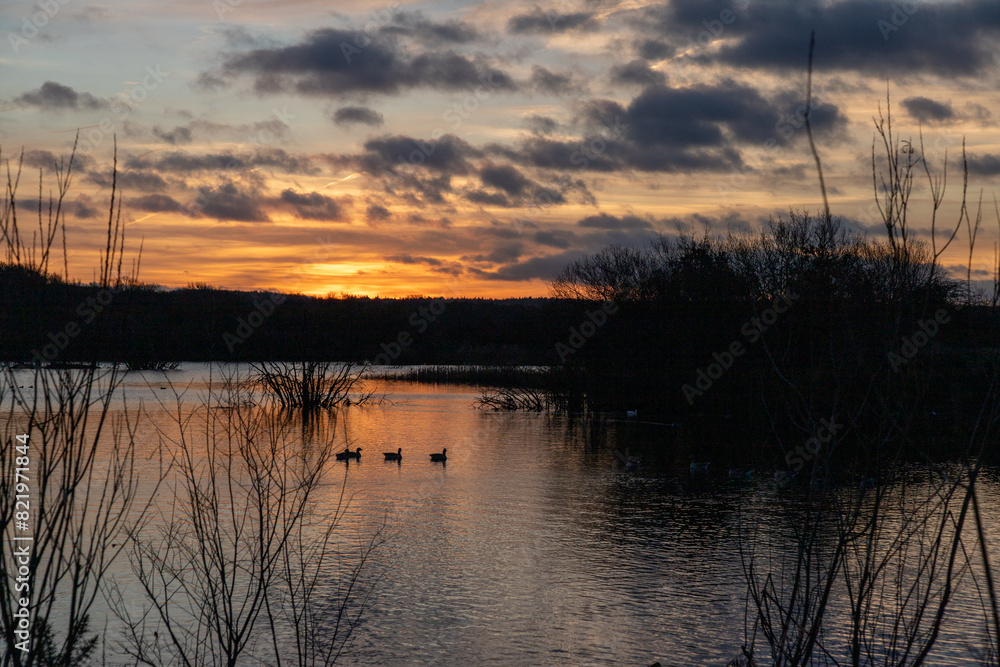 Scenic view of the Ashby Ville lake at sunrise. Scenic view of the Ashby Ville lake at sunrise.