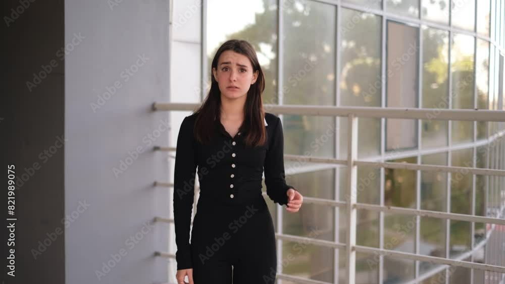 young brunette woman opened her mouth in surprise young brunette woman opened her mouth in surprise