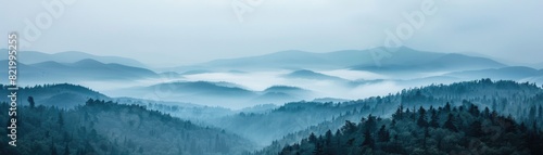 Mountain layers landscape in fog.