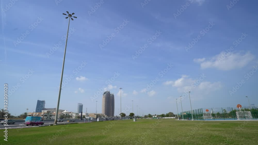 Timelapse of Traffic on road and park Abu Dhabi city Timelapse of Traffic on road and park Abu Dhabi city