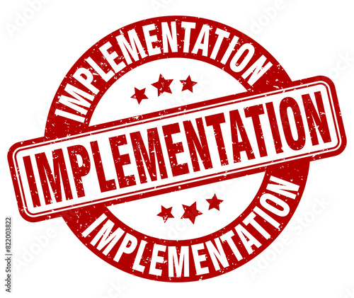implementation stamp. implementation label. round grunge sign