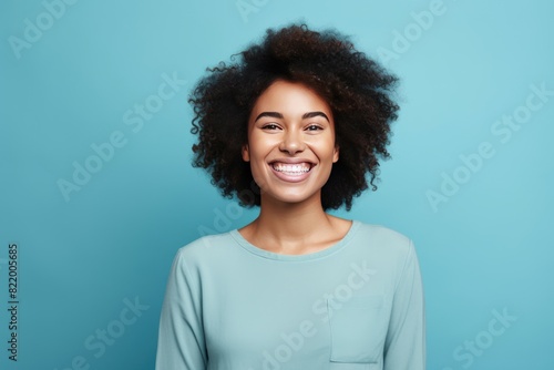 Aqua background Happy black independant powerful Woman realistic person portrait of young beautiful Smiling girl Isolated on Background ethnic diversity equality acceptance 