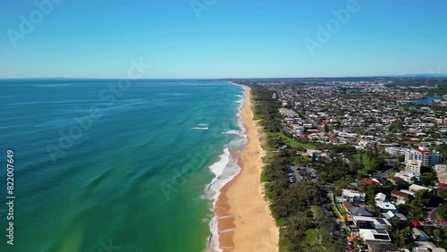Aerial footage of Buddina coastal suburb in the Sunshine Coast Region in Queensland, Australia photo