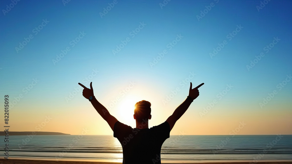 Fototapeta premium Male Adventurer at the Ocean Embracing the Beauty of Nature