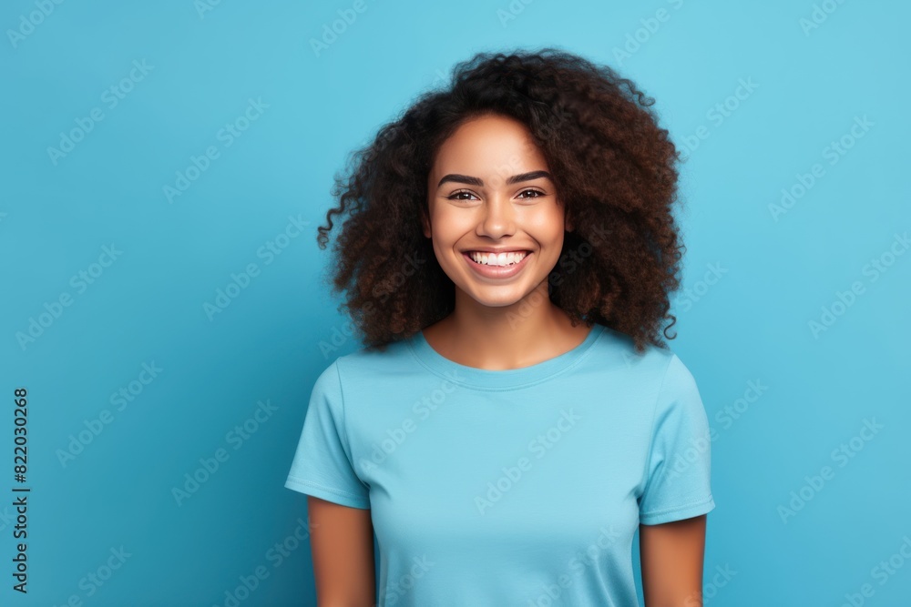 Blue background Happy black independant powerful Woman realistic person portrait of young beautiful Smiling girl Isolated on Background ethnic diversity equality acceptance concept with copyspace blan