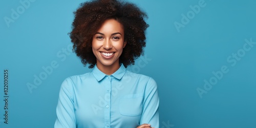 Blue background Happy black independant powerful Woman realistic person portrait of young beautiful Smiling girl Isolated on Background ethnic diversity equality acceptance concept with copyspace blan photo