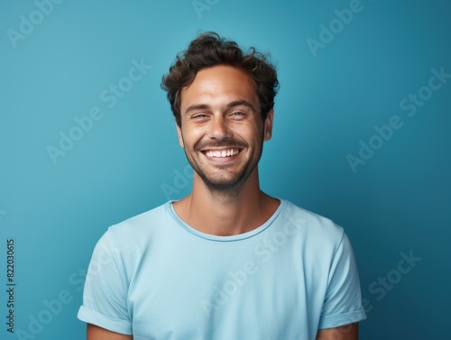Blue background Happy european white man realistic person portrait of young beautiful Smiling man good mood Isolated on Background Banner with copyspace 