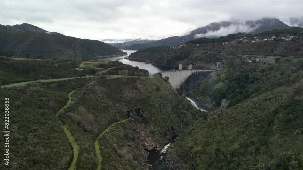 Aerial view of Limia River valley with dam and mountains, Lindoso, Vila Real District, Portugal. Aerial view of Limia River valley with dam and mountains, Lindoso, Vila Real District, Portugal.