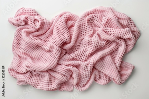 Stack of pink towels on clean white background. Suitable for bathroom or spa concept