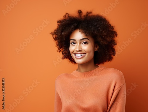 Coral background Happy black independant powerful Woman realistic person portrait of young beautiful Smiling girl Isolated on Background ethnic diversity equality acceptance