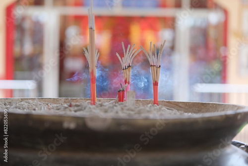 incense sticks in a temple photo