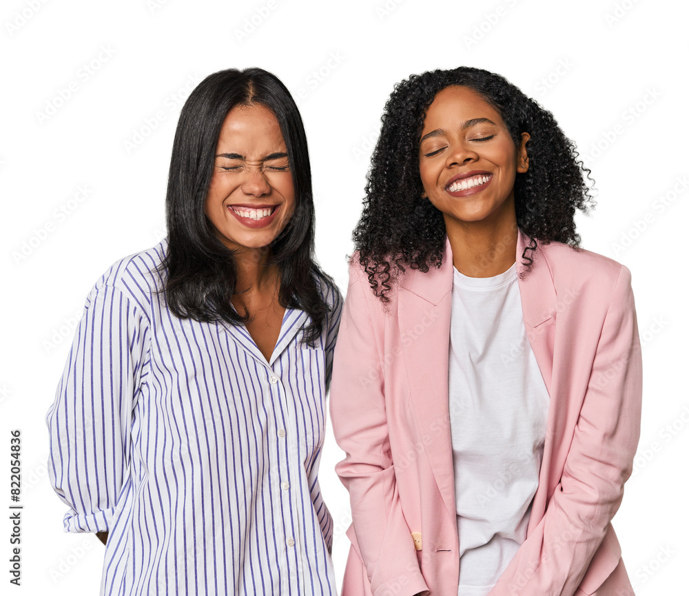 Young Latin businesswomen in studio laughs and closes eyes, feels relaxed and happy. Young Latin businesswomen in studio laughs and closes eyes, feels relaxed and happy.