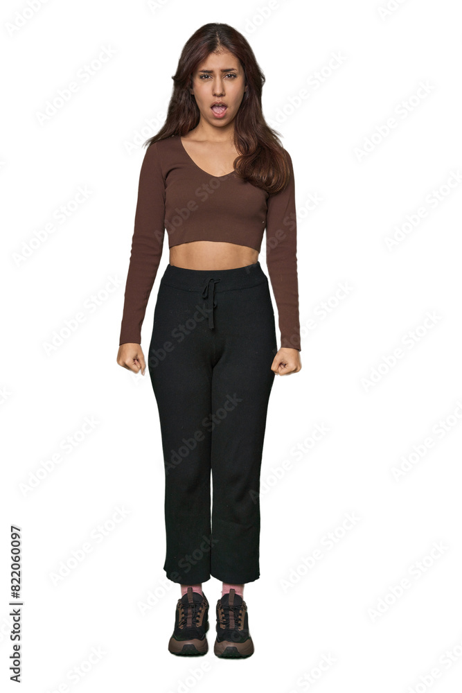 Middle Eastern woman, full body studio shouting very angry, rage concept, frustrated. Middle Eastern woman, full body studio shouting very angry, rage concept, frustrated.