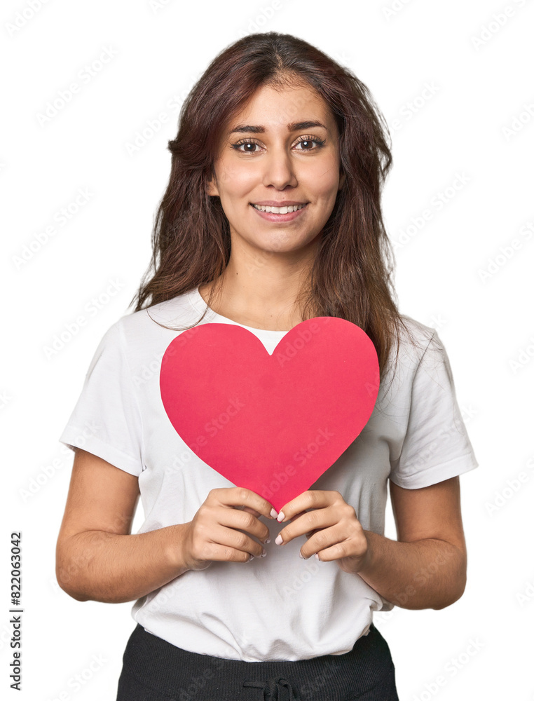 Young Middle Eastern woman holding paper heart, love concept Young Middle Eastern woman holding paper heart, love concept