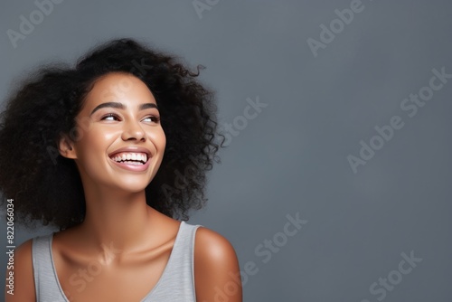 Gray background Happy black independant powerful Woman realistic person portrait of young beautiful Smiling girl Isolated on Background ethnic diversity equality 