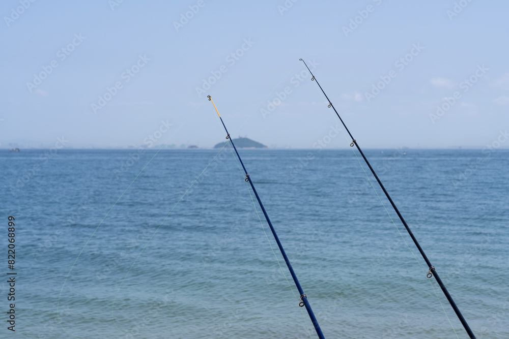 View of the fishing rod at the seaside View of the fishing rod at the seaside