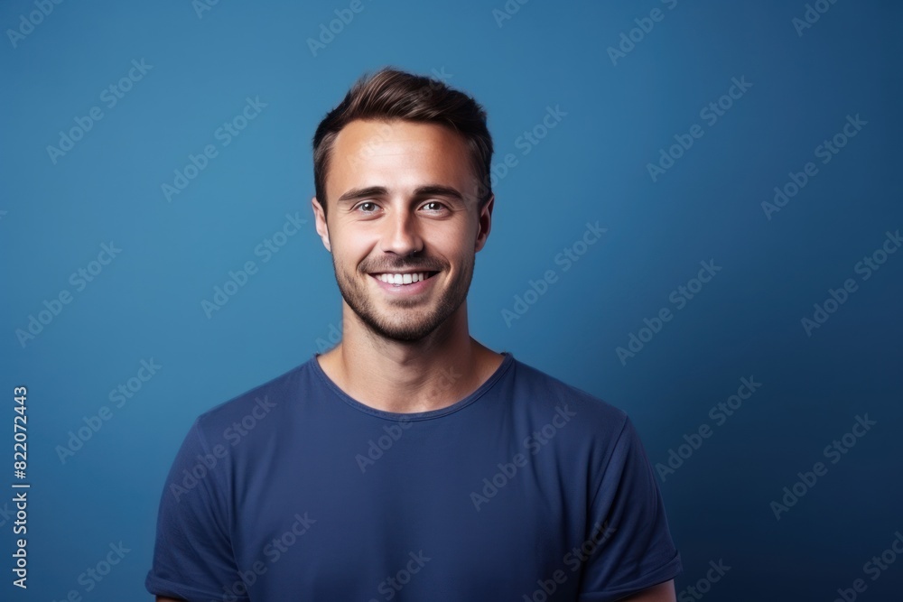 Indigo background Happy european white man realistic person portrait of young beautiful Smiling man good mood Isolated on Background Banner with copyspace blank empty copy space 