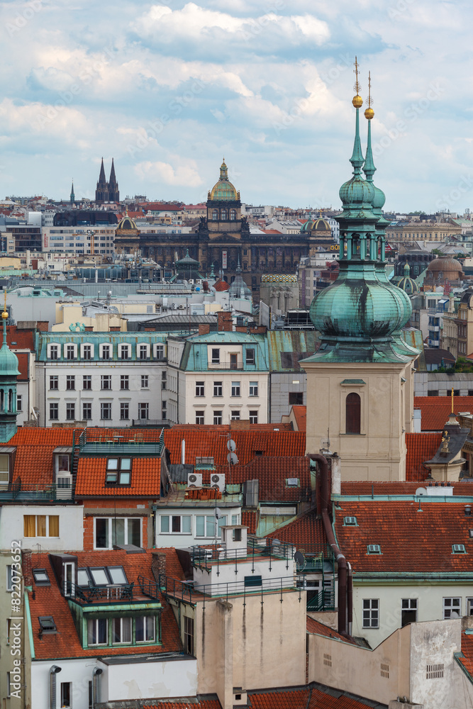Fototapeta premium Aerial view of St Nicholas church and the historical buildings of Prague, Czech Republic