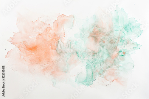 Soft apricot and mint green delicately watercolored against a white canvas. photo