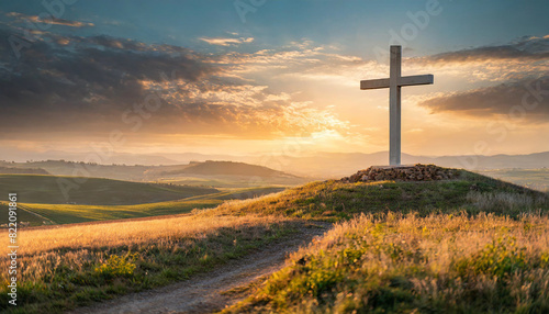 Christian cross in serene sunset landscape with soft lighting, symbolic of faith and tranquility. Copy space available