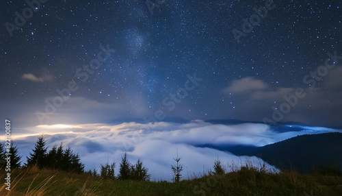 Abstract background with glowing stars and clouds in night
