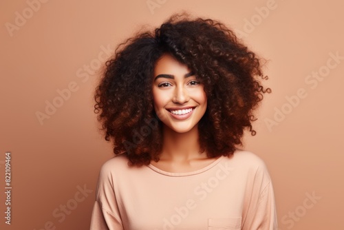 Peach background Happy black independant powerful Woman Portrait of young beautiful Smiling girl good mood Isolated on Background Skin Care Face Beauty Product 