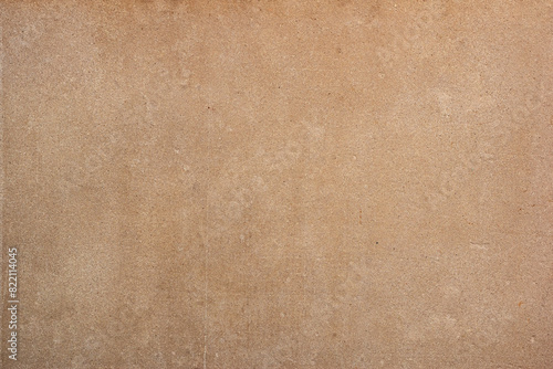 Pressed beige chipboard texture. Wooden background wallpaper. Chipboard background photo