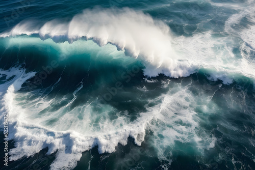 Spectacular aerial top view background photo of ocean sea water white wave splashing in the deep sea. Drone photo backdrop of sea wave in bird eye waves.