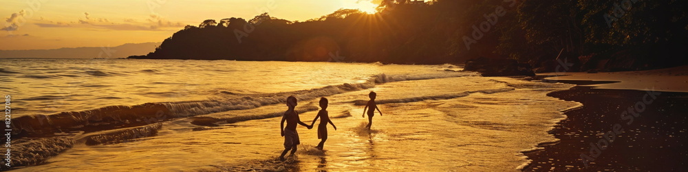 Fototapeta premium Children Strolling on a Sunset Beach with Silhouetted Reflections, scenic view, relaxation, vacation moment, design template, space for text, travel inspiration, banner, lifestyle image