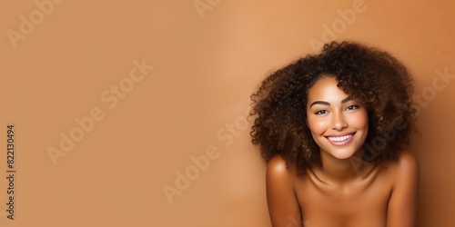 Tan background Happy black independant powerful Woman Portrait of young beautiful Smiling girl good mood Isolated on Background Skin Care Face Beauty Product Banner with copyspace 