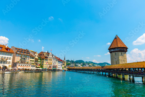 City of Lucerne with Chapel Bridge Tower in a Sunny Day in Switzerland.