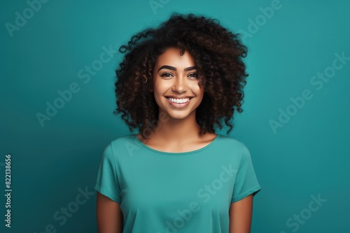 Turquoise background Happy black independant powerful Woman Portrait of young beautiful Smiling girl good mood Isolated on Background Skin Care Face Beauty Product Banner