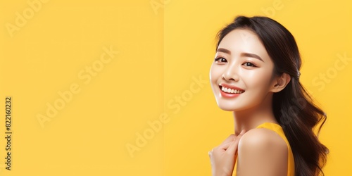 Yellow background Happy Asian Woman Portrait of young beautiful Smiling Woman good mood Isolated on Background Skin Care 