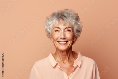 Beige background Happy european white Woman grandmother realistic person portrait of young beautiful Smiling Woman Isolated on Background Banner with copyspace 