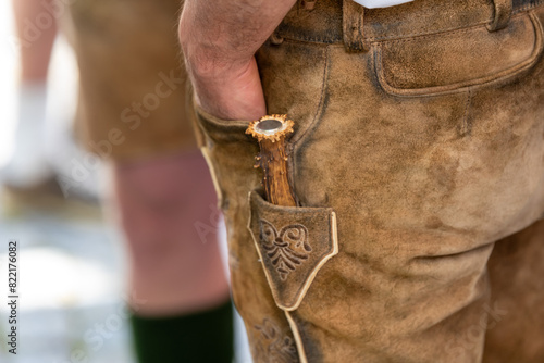 traditioinal leather trousers with pocket knife