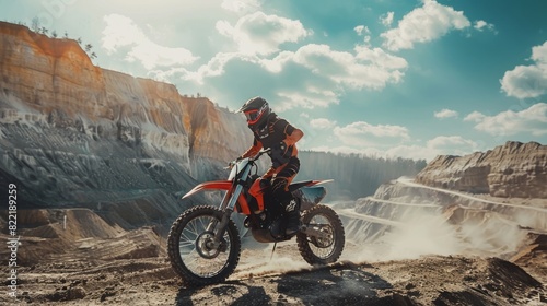 The off-road deserted quarry is a perfect setting for this Motocross FMX motorcycle ride. photo