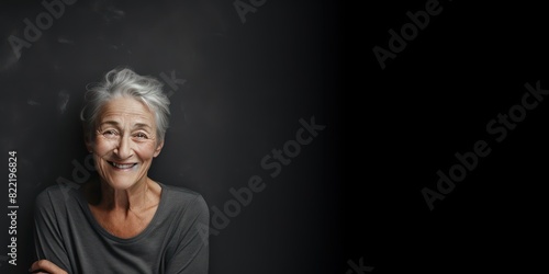 Charcoal background Happy european white Woman grandmother realistic person portrait of young beautiful Smiling Woman Isolated on Background Banner with copyspace 