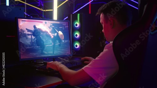 Gamer Plays Martial Arts Tournament Video Game On Computer. Martial Arts Warriors Fight Each Other In Tournament. Powerful Martial Arts Moves. Esports Tournament Battle. Gaming. Animation photo