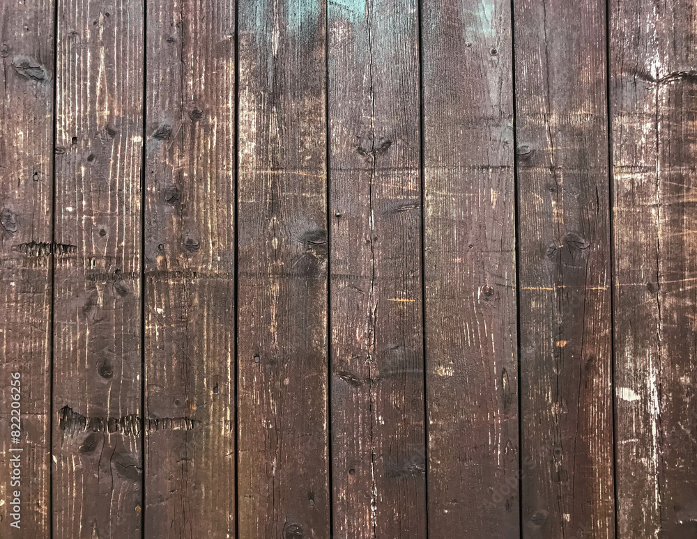 A wooden background with a lot of scratches and marks A wooden background with a lot of scratches and marks