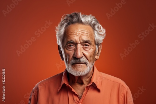 Coral background sad european white man grandfather realistic person portrait older person beautiful bad mood old man