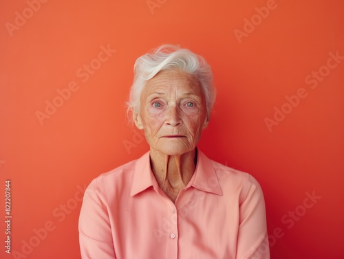Coral background sad European white Woman grandmother realistic person portrait of young beautiful bad mood expression Woman Isolated Background depression anxiety fear burn out health issue problem m