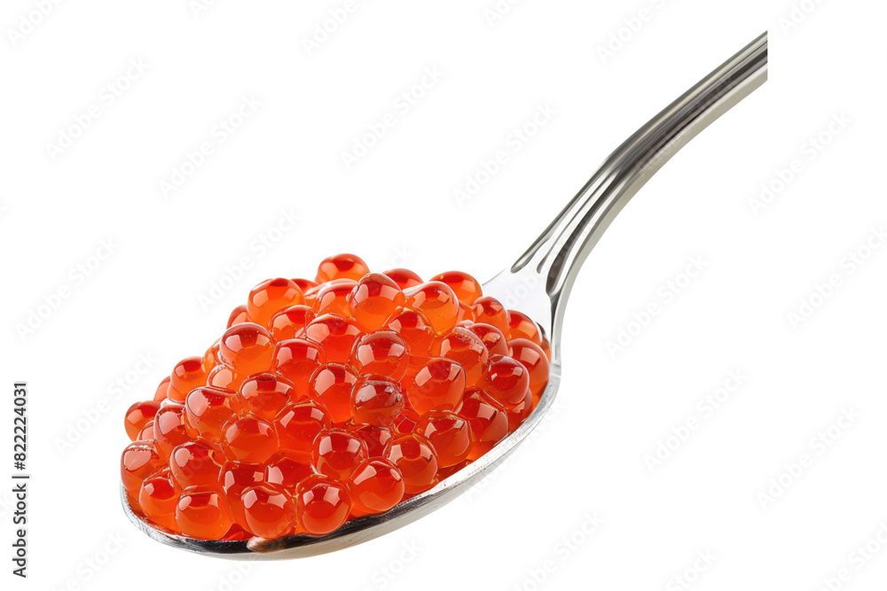 Red fresh grainy salmon caviar in metal spoon isolated on transparent background Red fresh grainy salmon caviar in metal spoon isolated on transparent background