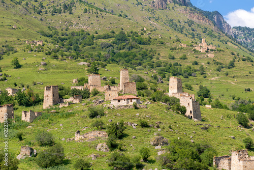 The Egical tower complex. The ruins of an ancient city high in the mountains. Medieval towers built of stone to protect against attacks. Ingushetia. The North Caucasus. Russia photo