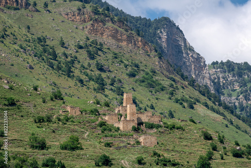 The Egical tower complex. The ruins of an ancient city high in the mountains. Medieval towers built of stone to protect against attacks. Ingushetia. The North Caucasus. Russia photo