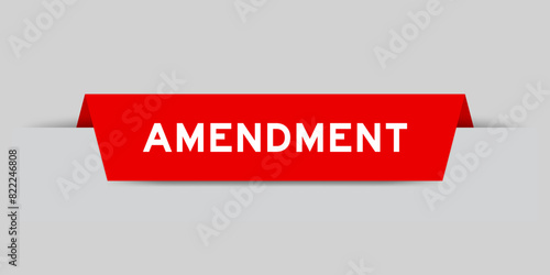 Red color inserted label with word amendment on gray background