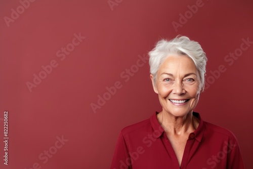 Maroon background Happy european white Woman grandmother realistic person portrait of young beautiful Smiling Woman Isolated on Background Banner 