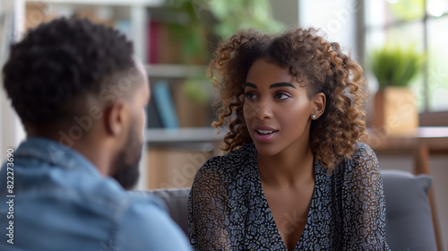 two individuals engaged in conversation, demonstrating active listening, empathy, understanding. Express viewpoints respectfully, without interrupting, belittling each other. photo